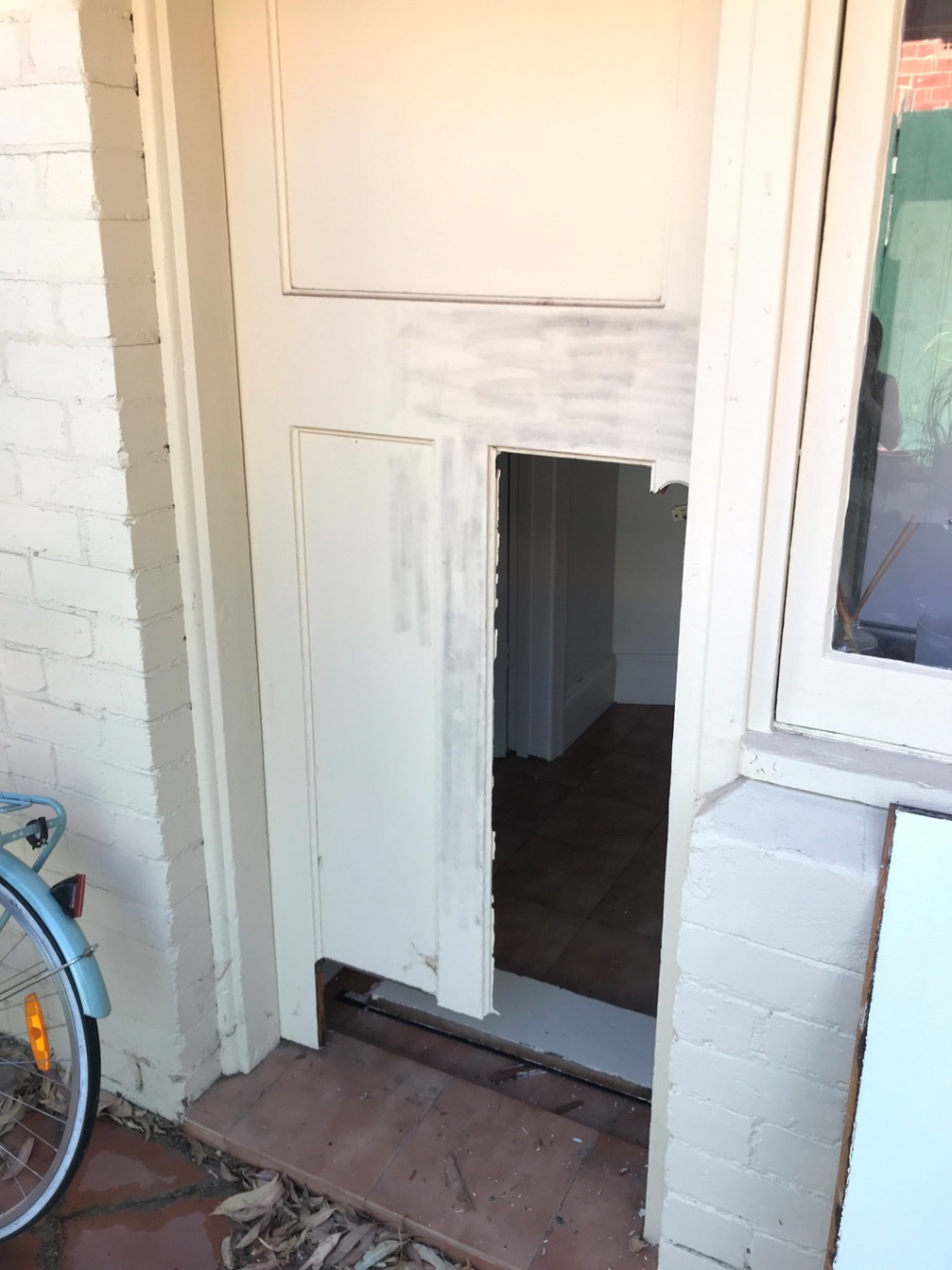 Door frame damage from forced entry during residential break-in in Melbourne eastern suburbs