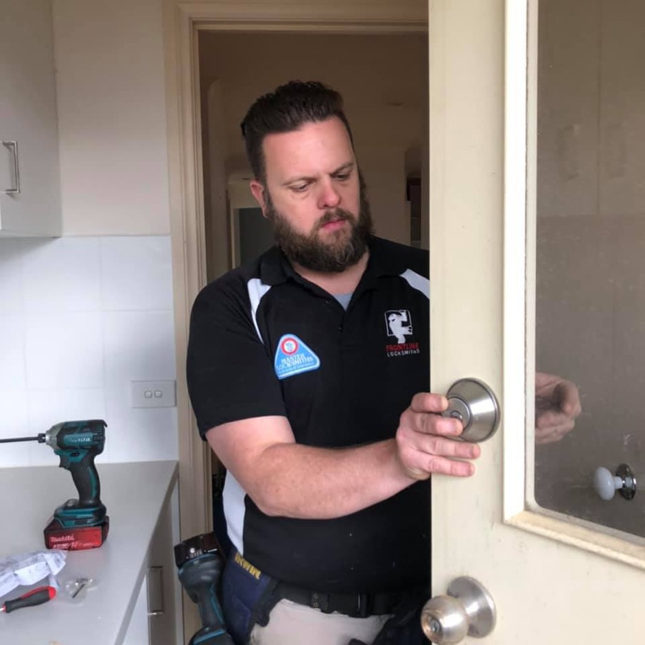 Locksmith testing a residential key and lock in Croydon Melbourne