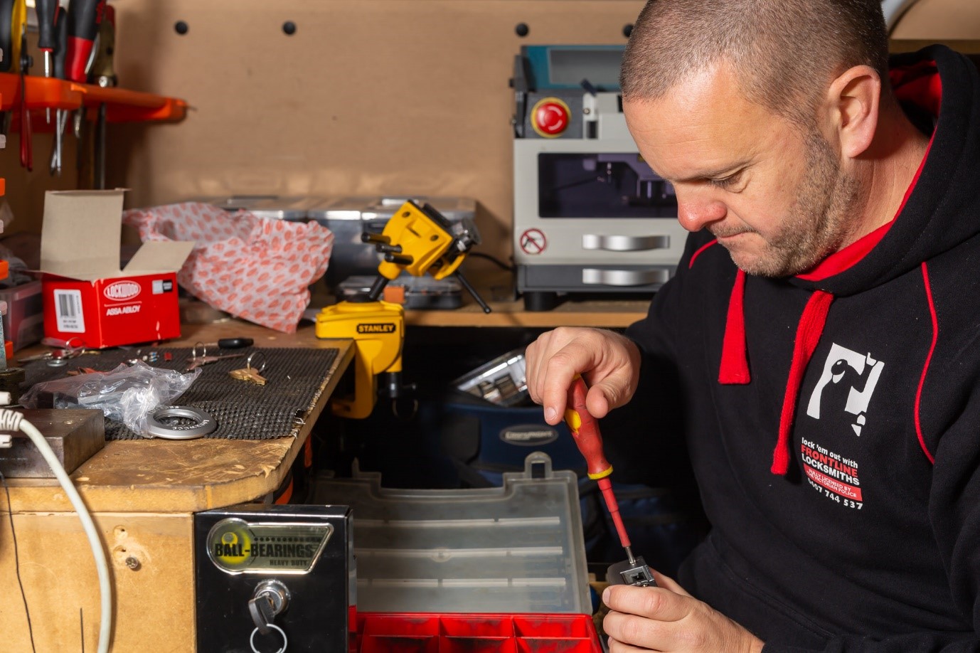Frontline Locksmiths technician installing a residential deadlock in Donvale Melbourne eastern suburbs
